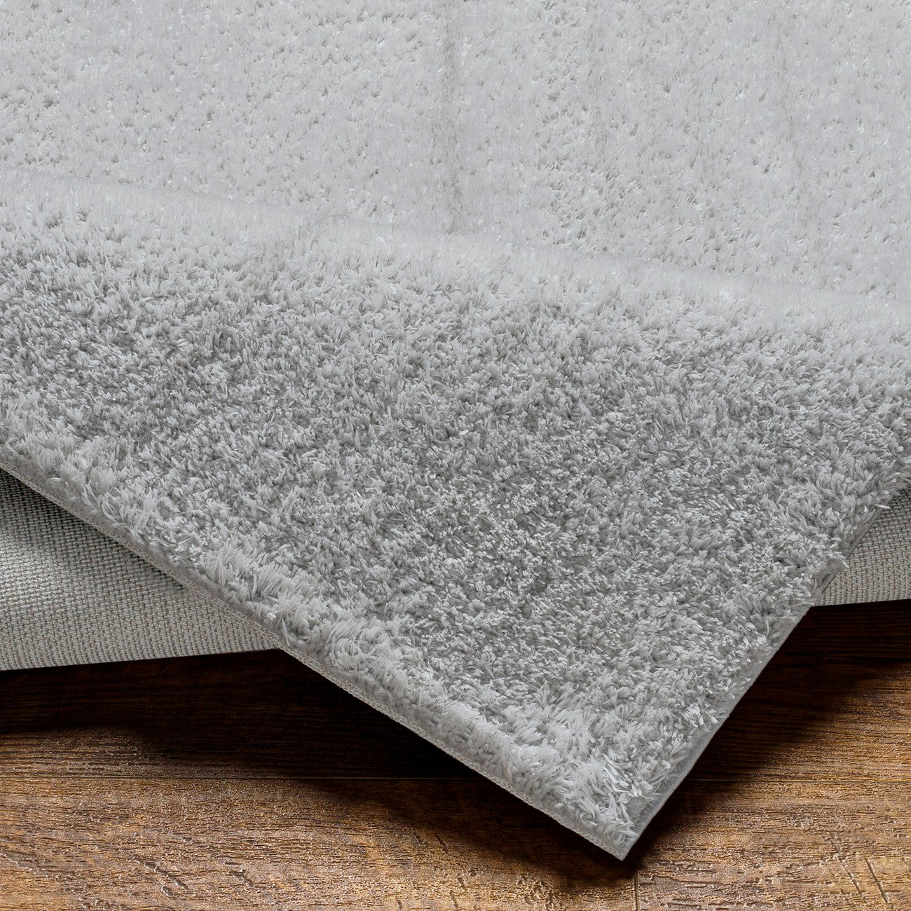 CLAIRE Round Shaggy Solid Color Plush Pile Grey Area Rug Fold