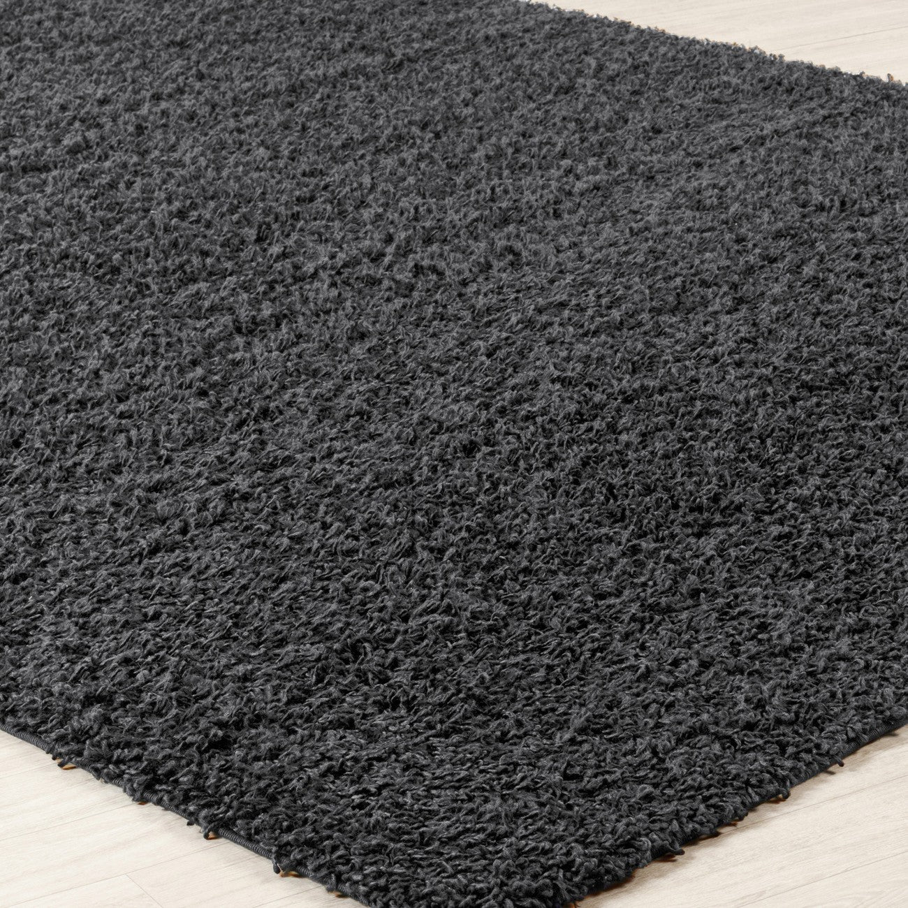 LILLY Shaggy Solid Color Plush Pile Dark Grey Area Rug Corner