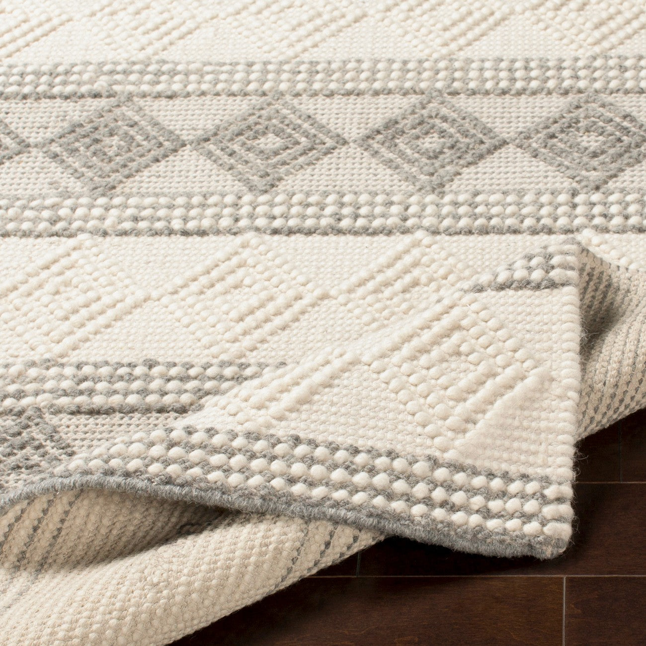 TARINI Hand-Woven Cottage Wool Charcoal Area Rug Fold