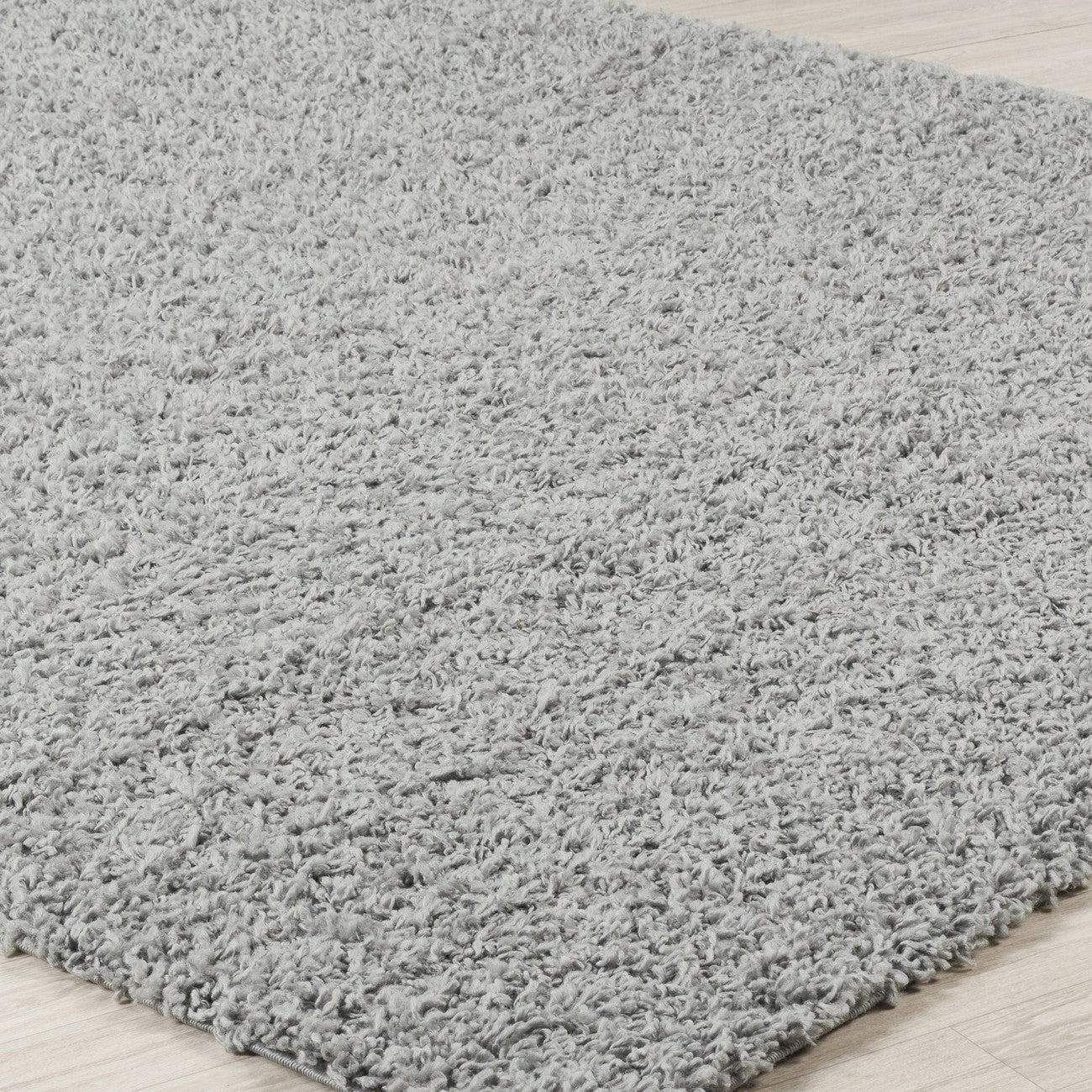 LILLY Shaggy Solid Color Plush Pile Grey Area Rug Corner