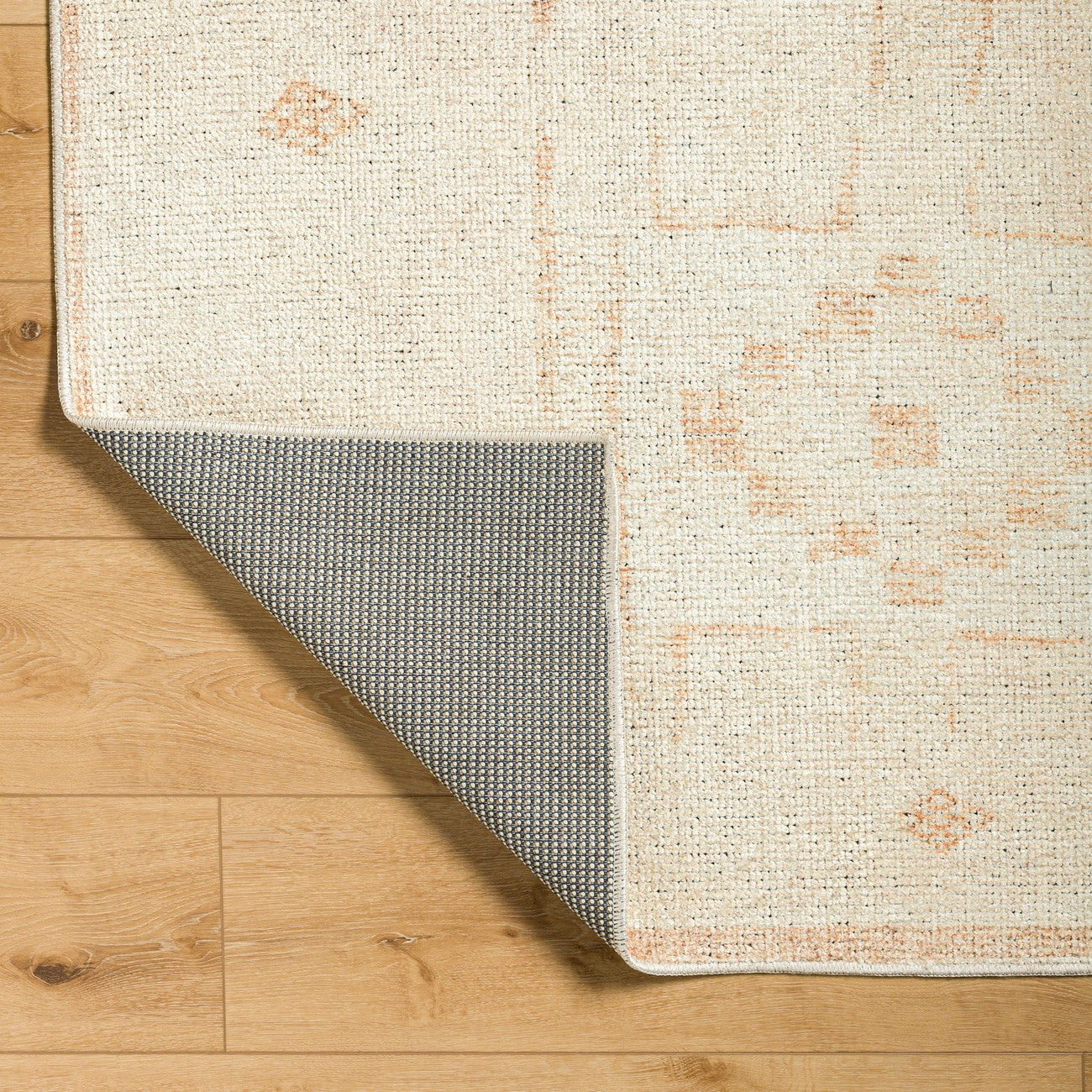 MAMTA Becki Owens x Livabliss Global Berber Apricot Area Rug Fold