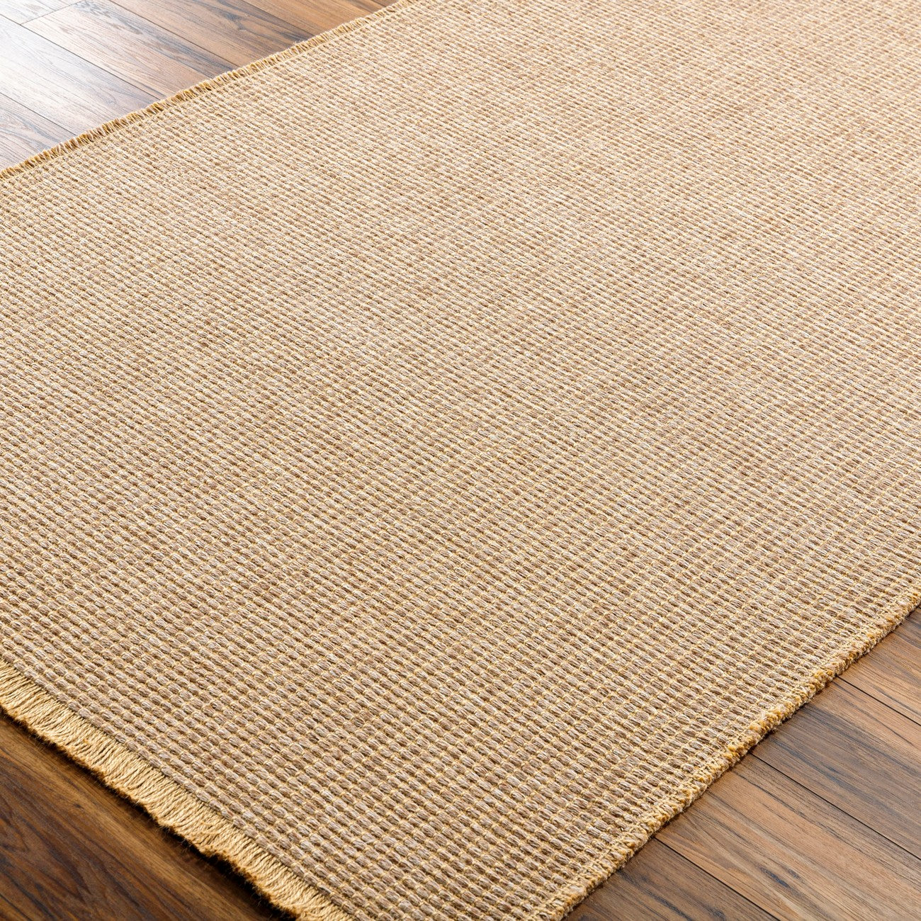 PAVI Becki Owens x Livabliss Solid and Border Brown Jute Area Rug Corner