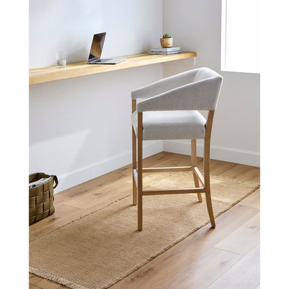 PAVI Becki Owens x Livabliss Solid and Border Camel Jute Area Rug Roomscene