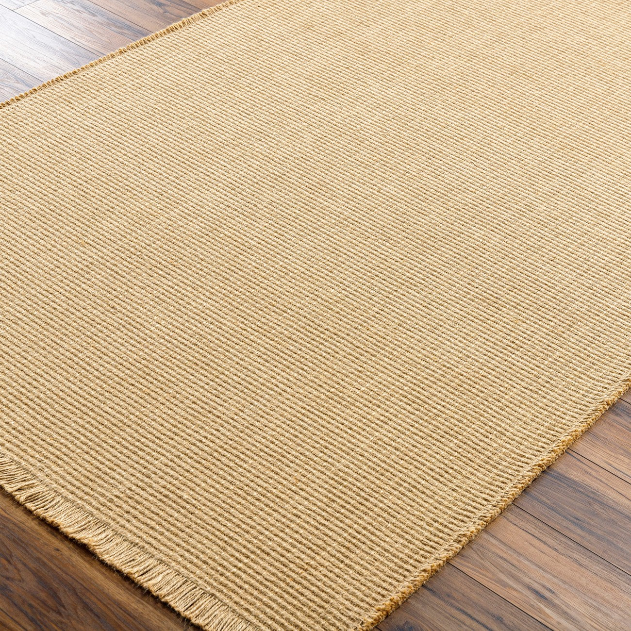 PAVI Becki Owens x Livabliss Solid and Border Camel Jute Area Rug Corner