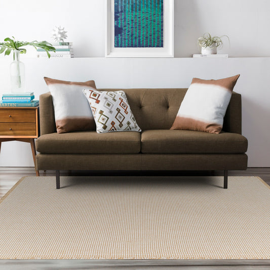 PAVI Becki Owens x Livabliss Solid and Border Mocha Jute Area Rug Roomscene