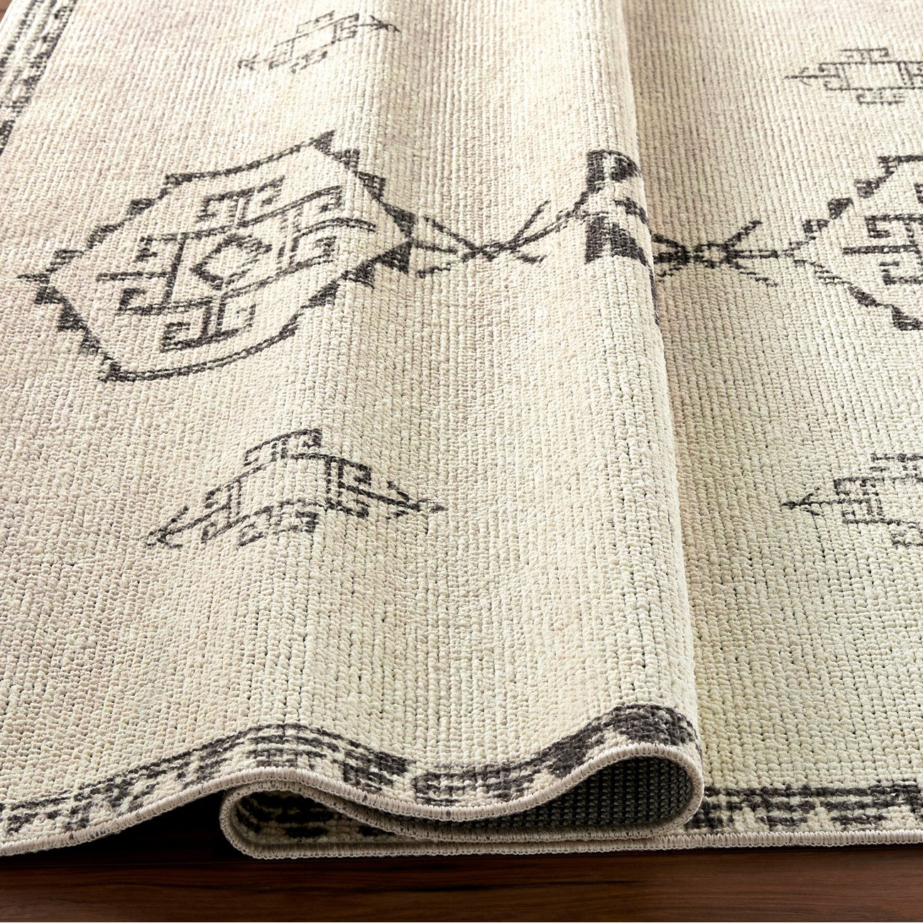 SUMAN Becki Owens x Livabliss Global Berber Ivory/Black Area Rug Fold
