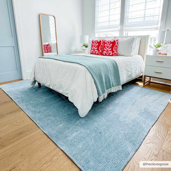 Isako Blue Solid Washable Area Rug