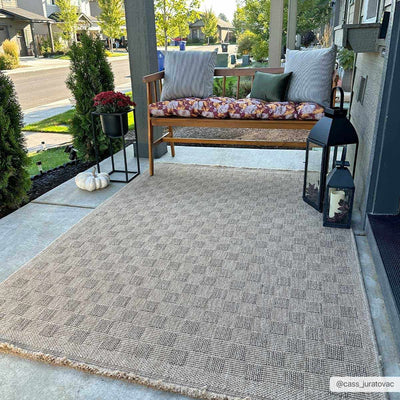 Jurek Beige Checkered Area Rug