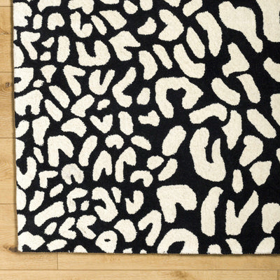 Akeem Leopard Print Area Rug