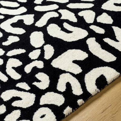 Akeem Leopard Print Area Rug