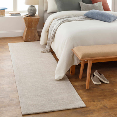 Mariba Ivory Wool Area Rug