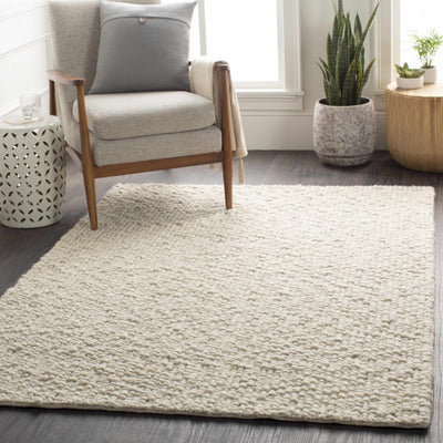 Penmaenmawr Solid Cream Premium Woven Wool Area Rug