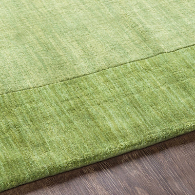 Bordered Solid Green Wool Rug