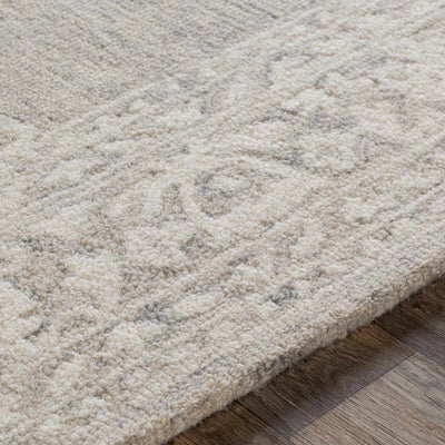 Roessleville Cream Wool Area Rug