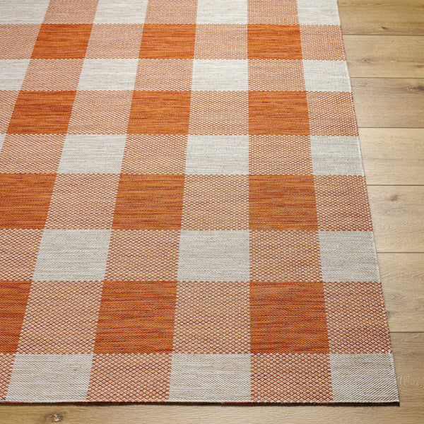 Meris Orange Plaid Area Rug