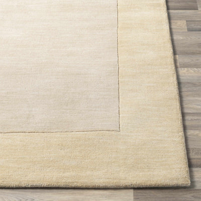 Bordered Solid Beige Wool Rug