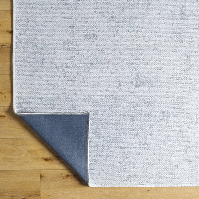 Isako Light Blue Solid Washable Area Rug