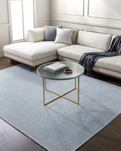 Isako Light Blue Solid Washable Area Rug